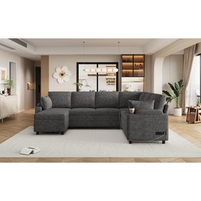 Lit en forme de U en gris avec amplement de places assises, rangement et canapé-lit en chenille, porte-gobelet et porte-gobelets