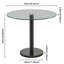 Table basse moderne avec plateau en verre et cadre en marbre noir