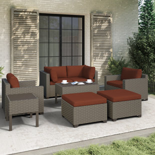 https://assets.wfcdn.com/im/65882777/resize-h310-w310%5Ecompr-r85/2384/238415043/avalisse-7-piece-outdoor-conversation-set-with-club-chairs-ottomans-and-end-table-in-summer-fog-wicker.jpg