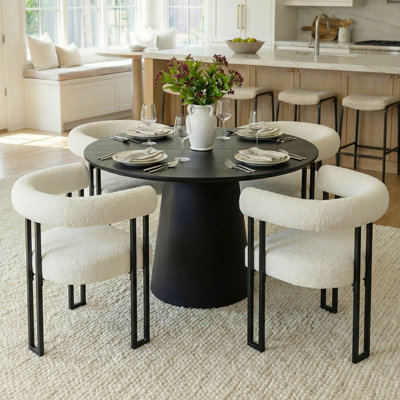 47"–85" Extendable Oval Black Pedestal Dining Table With Bouclé Upholstered Chairs