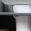 Armoire de salle de bain grise pour évier. Gain de place avec 2 portes et une tablette. Ajout d'espace de rangement. Tablette réglable en option. Solide. Capacité de 33 lb Rangement pour lavabo gris L 23,5 po x l 11,81 po. &
