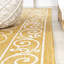 Tapis d'intérieur / extérieur jaune tissé texturé Debbe-137864443