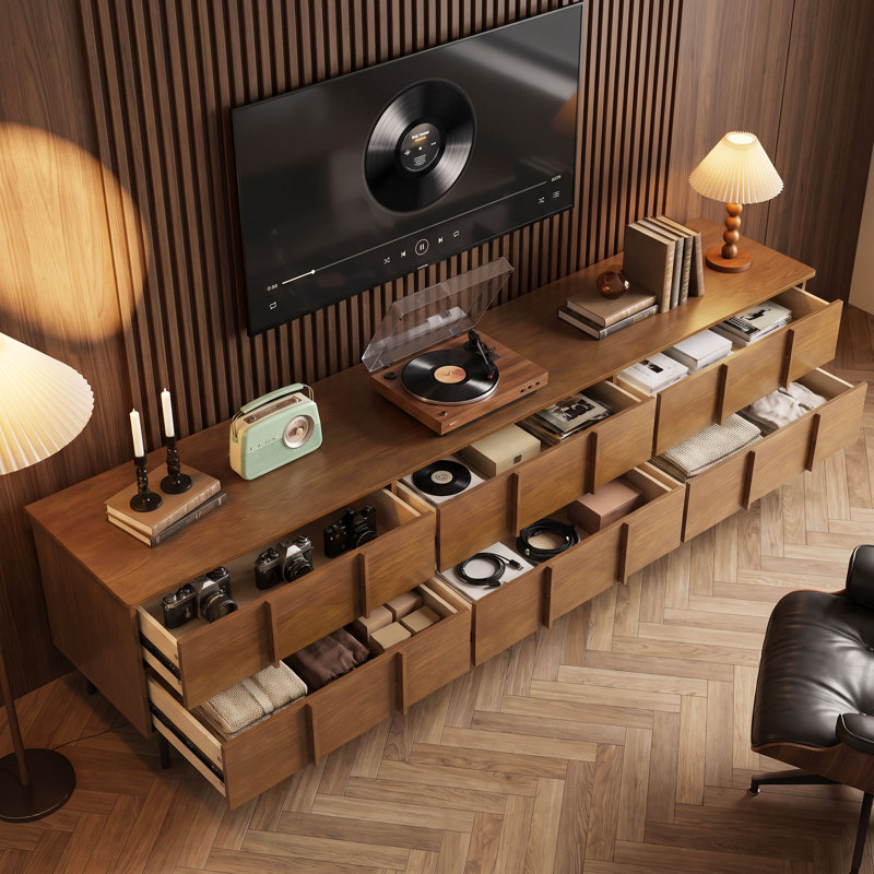 Meuble télé en bois massif de 220 cm (86,61 po) pour téléviseurs jusqu'à 229 cm (90 po), avec 6 tiroirs, pieds en métal et système de gestion des câbles.