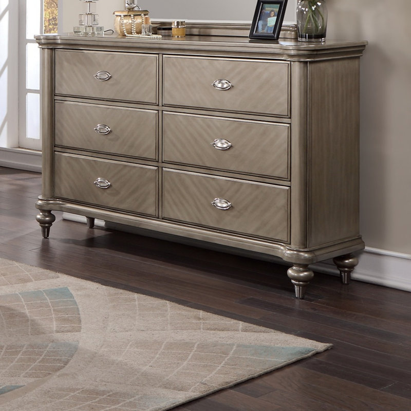Commode de luxe avec finition argentée et champagne