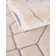 Tapis de style glam à motif géométrique blanc et argenté Glam