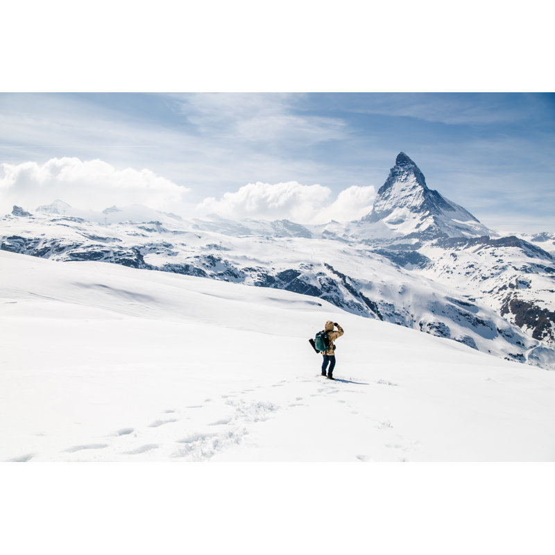 Man Looking At The Background Of Matterhorn. by Pathara - Wrapped Canvas Print, 30.48cm x 45.72cm