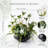 Artificial Greenery Arrangement with White Blooms in Black Ceramic Bowl