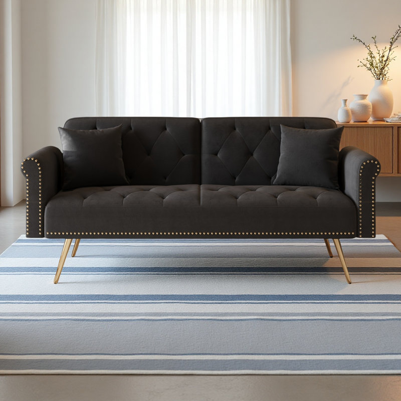 Canapé-lit de 69,7 pouces de long recouvert de tissu de velours, avec garniture cloutée et accompagné d'un coussin décoratif assorti