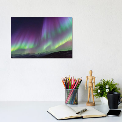 " Iceland, Akureyri The Northern Lights Glow In Unbelievable Colors II " by Ellen Goff
