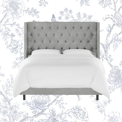 Avala Upholstered Wingback Bed