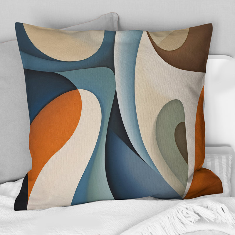 Coussin décoratif bleu à formes symétriques et orange