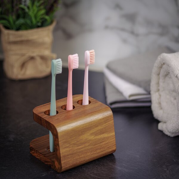 https://assets.wfcdn.com/im/65932113/resize-h600-w600%5Ecompr-r85/1397/139725429/Teak+Designer+Toothbrush+Holder.jpg