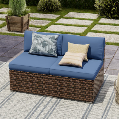 2 Piece Rattan Sectional Seating Group With Cushions