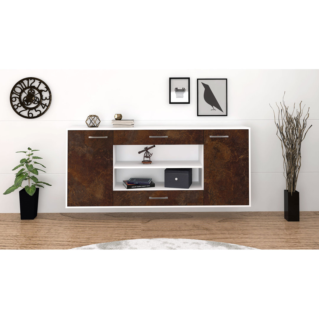 Das Sideboard Mussab hat Metallgriffe. Es hat die Maße 180 cm x 79 cm x 35 cm.