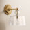 Single Light Armed Sconce