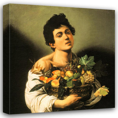 Garçon avec un panier de fruits