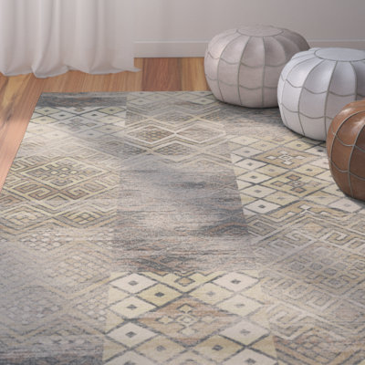 Aderemi Southwestern Stone Area Rug