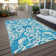 Tapis intérieur / extérieur en polyester tissé à la machine Chayden
