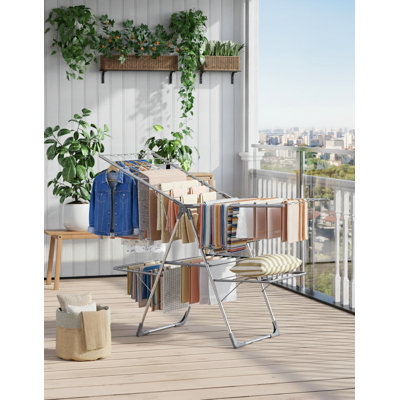 Gray Foldable Metal Clothes Rack, 55.7×22.8×36.8 Inches, With Non-Slip Feet. Suitable For Clothing/Bedding. Indoor And Outdoor Use. Space-Saving And Easy To Assemble.