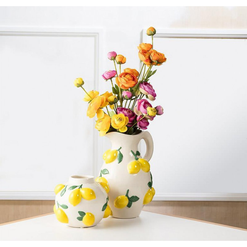 Vase rond avec citrons