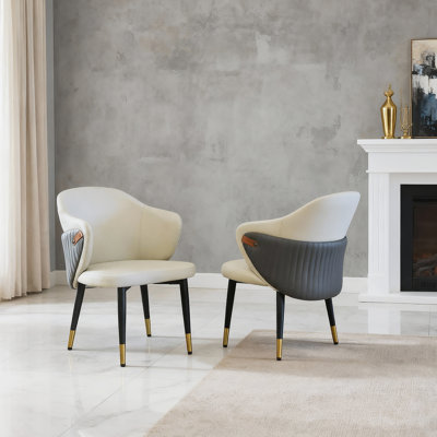 Chaises de salle à manger modernes en cuir PU avec une conception ergonomique et des pieds en acier au carbone durables pour une utilisation polyvalente.