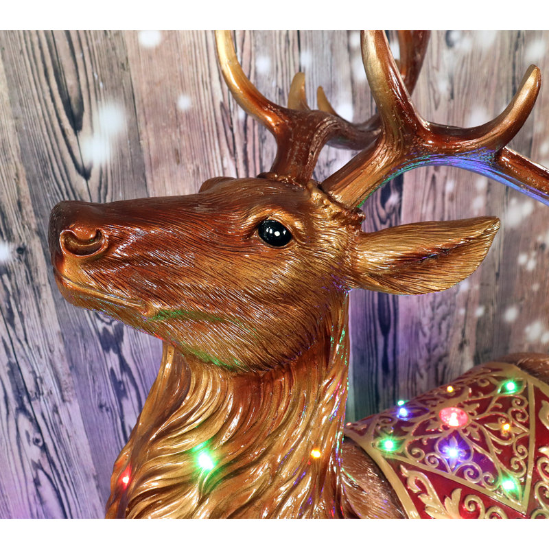 Fraser Hill Farm 5-Ft. Reindeer Holiday Figurine with Metallic Finish with Multi-Color LED Lights