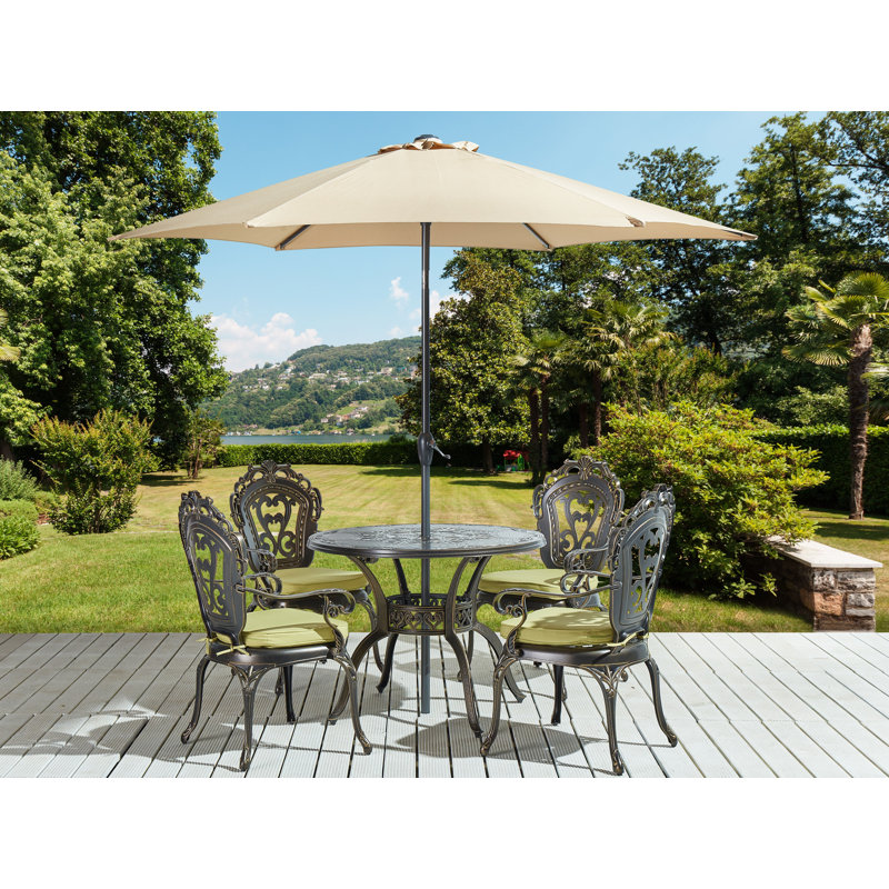 Fritch 4 - Person Patio Dining Set with Round Table , Cushions Included