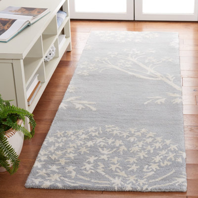Hodgson Hand Tufted Wool/Viscose Floral Rug in Blue/Ivory