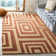 Tapis géométrique doré clair en laine noué à la main Zeled Santa Fe