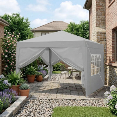 Pop-Up Outdoor Canopy Tent Measuring 10x10 Feet, Includes Removable Zippered Sidewall, 2 Sidewall Panels with Windows, 4 Sand Weight Bags, and Carry Bag, Gray Color