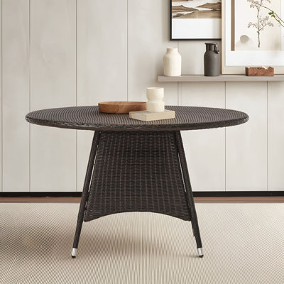 Table de salle à manger d'extérieur en résine tressée PE et fer thermolaqué, idéale pour les repas, les apéritifs et les repas quotidiens en plein air.