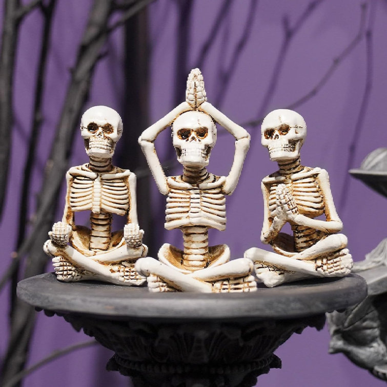 https://assets.wfcdn.com/im/65989098/resize-h755-w755%5Ecompr-r85/2557/255770506/Halloween+Decorations+Yoga+Skeleton-Decor+Collectible-Figurines+-+Realistic+Meditating+Statues+Skeleton+Halloween+Decor+Indoor+Resin+Sitting+Zen+Skull+Decor+Set+Of+3%2C+2%2A1.5%2A3.75+In.jpg