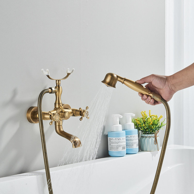 Robinet de baignoire à pattes en laiton antique avec douchette croisée