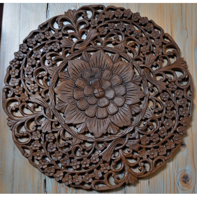 Décoration murale ronde en bois de teck sculpté à la main