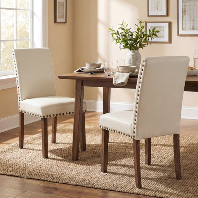Chaises de salle à manger, chaise de salle à manger rembourrée en similicuir avec garniture cloutée et pieds en bois robuste, chaises d'appoint de style Parsons moderne pour la cuisine, coussin épais pour le confort