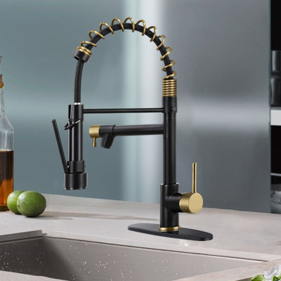 The Kitchen Faucet Features A Pull-Down Sprayer, Stainless Steel Single Handle, And A Spring Kitchen Faucet With A Sprayer.