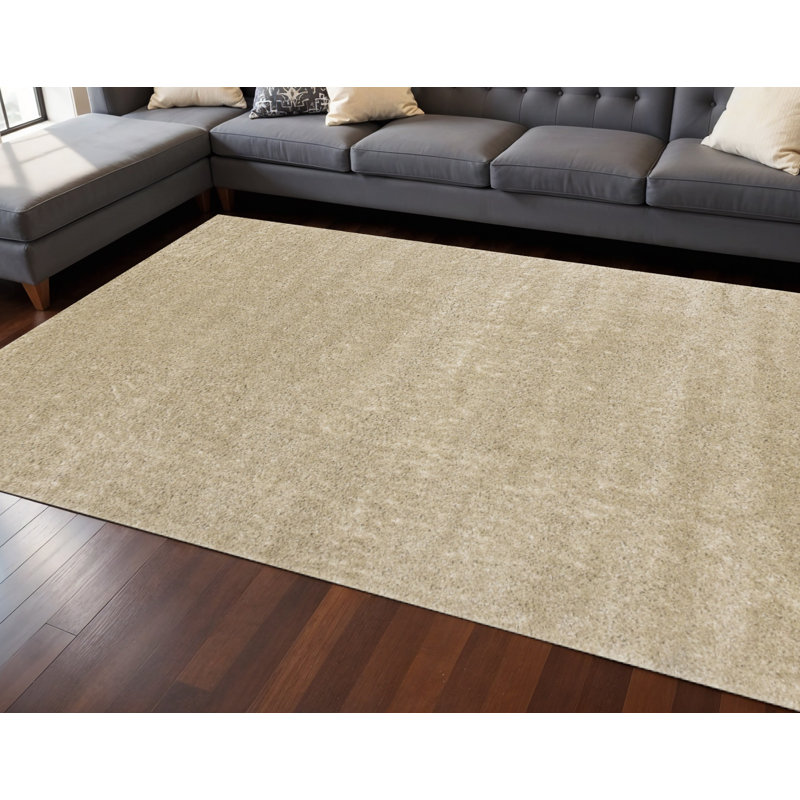 Tapis beige 8 pi x 11 pi