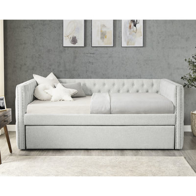 Lit de jour polyvalent gris avec paire de draps et garniture cloutée classique