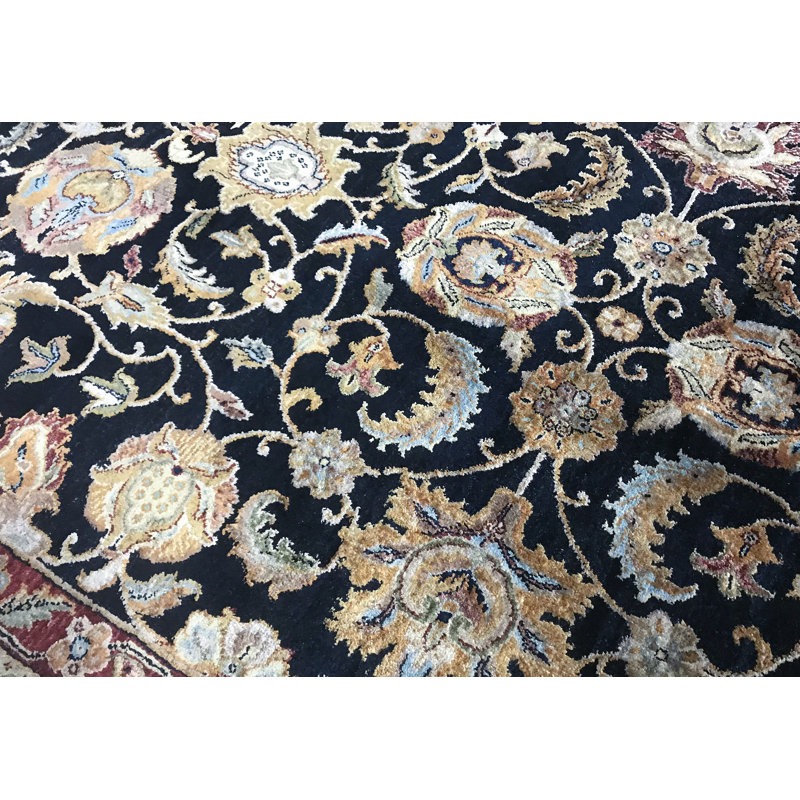 Tapis noir et ivoire de haute qualité noué à la main