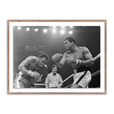 Adom "Muhammad Ali Punching Joe Frazier" Print