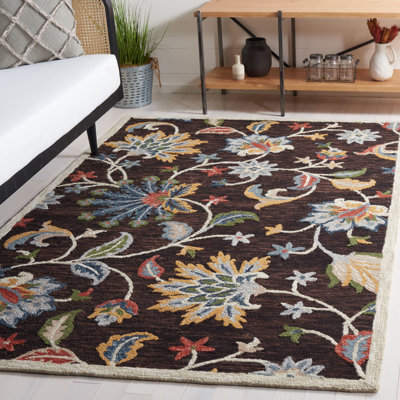 Tapis floral brun en laine Deaquaneil