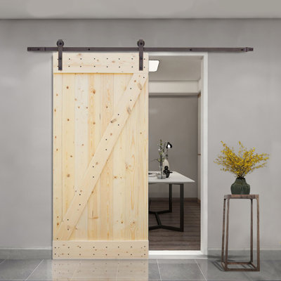 Porte de grange à panneaux en bois brut avec trousse de quincaillerie d'installation