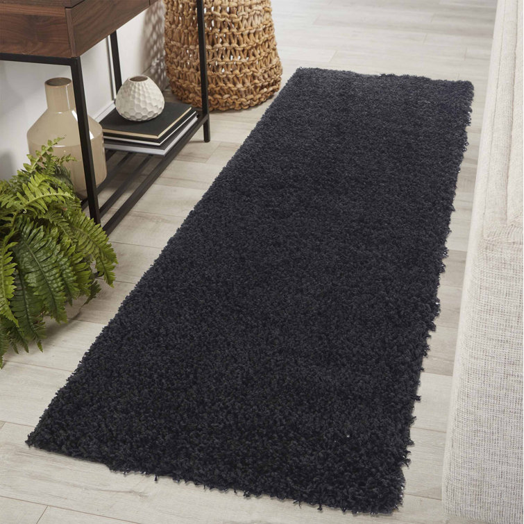 Esterly Shaggy Black Area Rug