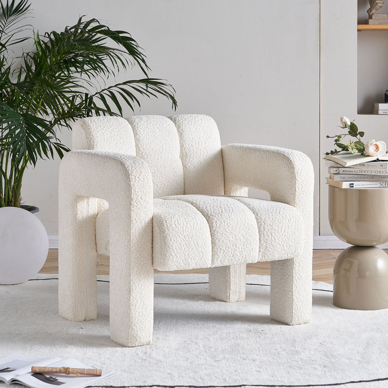 Charmant fauteuil d'appoint rembourré Boucle avec sièges confortables, conception unique et entretien facile pour un espace de vie confortable.