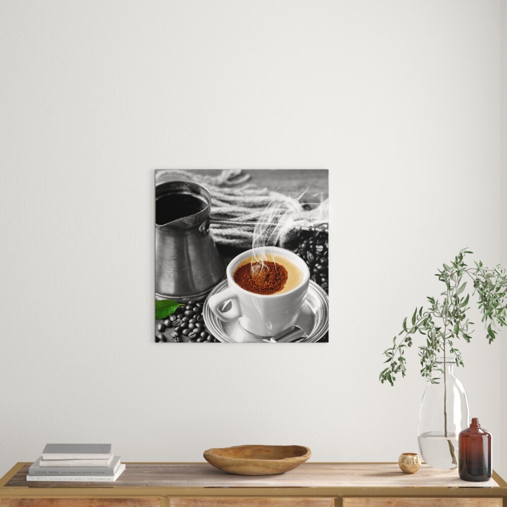 Leinwandbild Dampfender Kaffe mit Kännchen