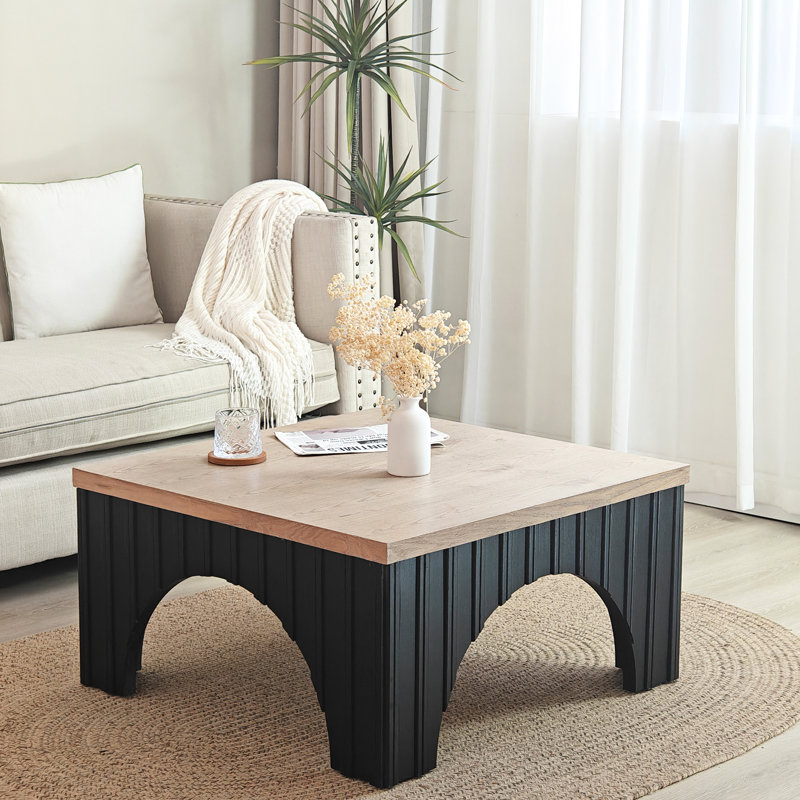Table basse en bois massif avec base noire - Grain naturel, polyvalente pour les bureaux
