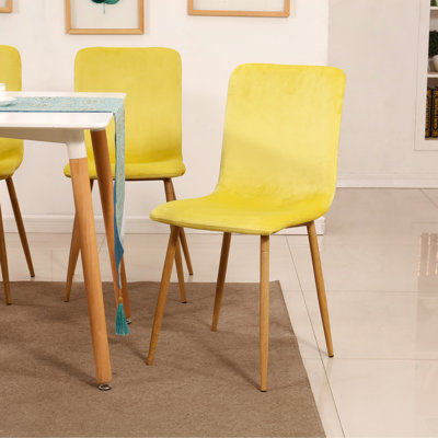 Chaise d'appoint en velours jaune