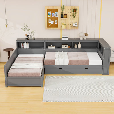 Lit plateforme simple en L en bois avec lit gigogne simple, tiroir de rangement, tablettes et station de charge