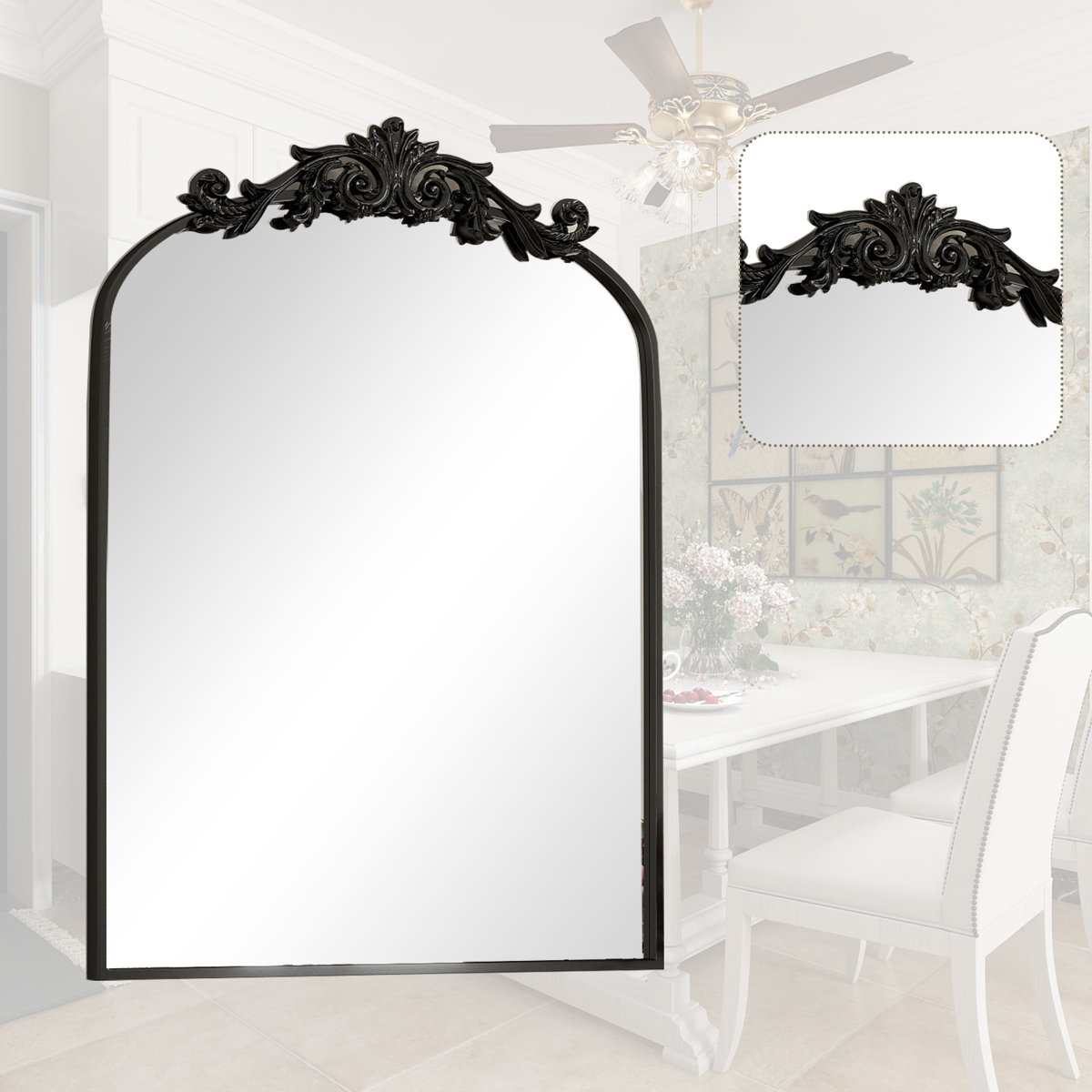 Black baroque arch mirror with ornate scrollwork crest shown against a faded dining room background and inset close-up of decorative detailing