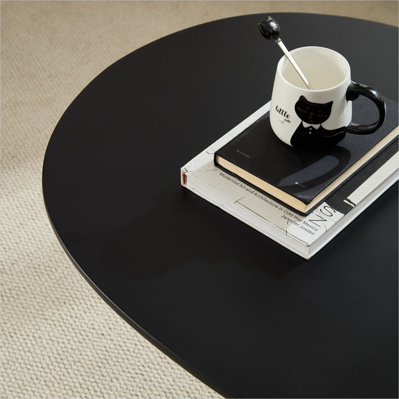Table basse ovale de 47,27 pouces avec base sculpturale en pierre empilée, fibre de verre minimaliste moderne, noir élégant